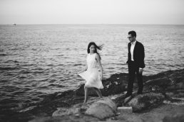 black and white engagement portrait photo in Valletta by the sea