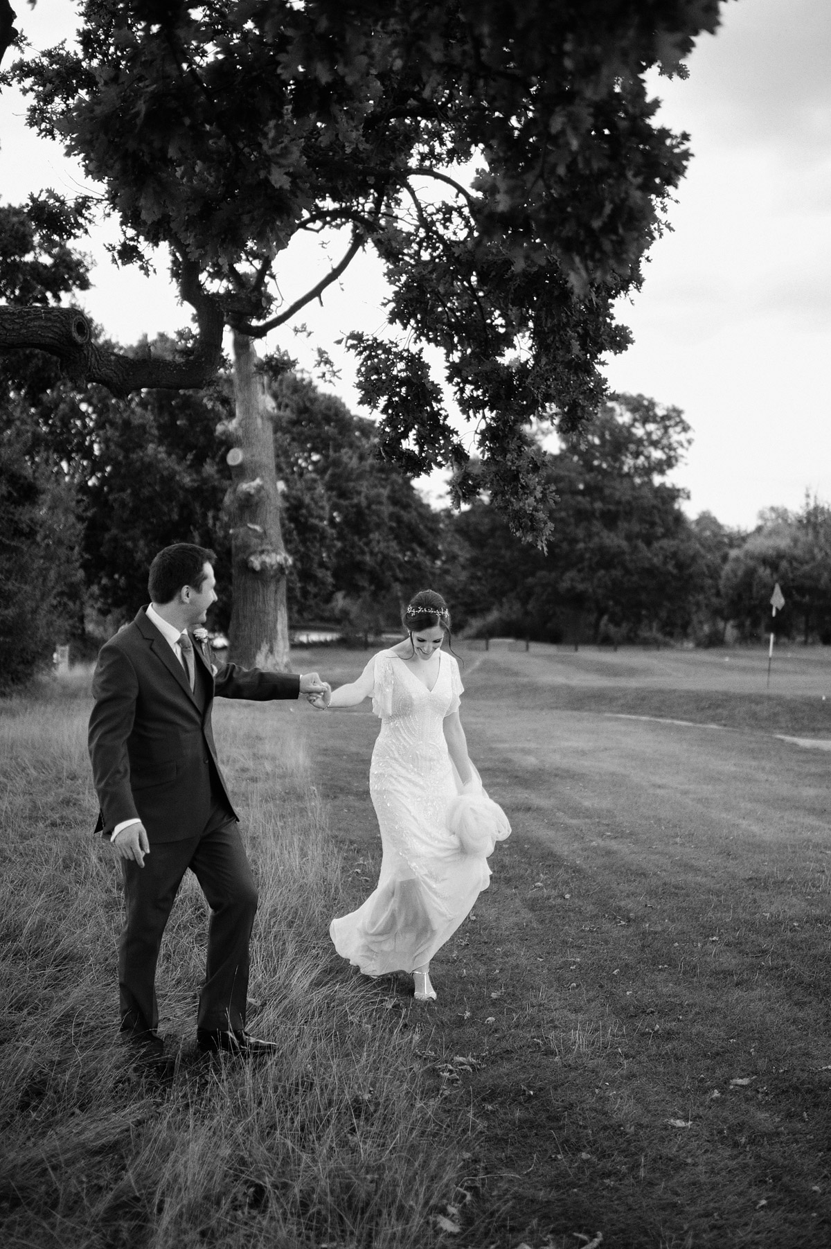 Wedding photographer London Wimbledon - wedding couple portrait at golf course