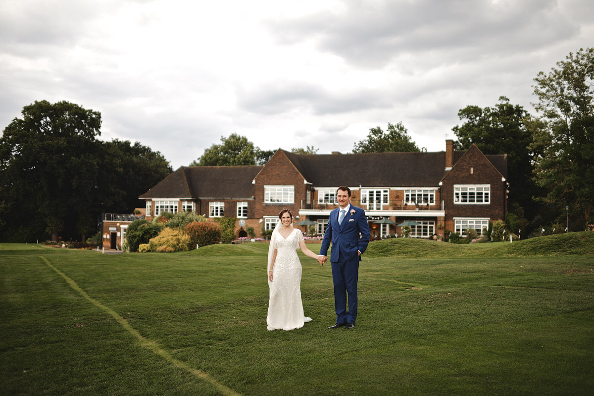 Wedding photographer London Wimbledon - wedding couple portrait at golf course