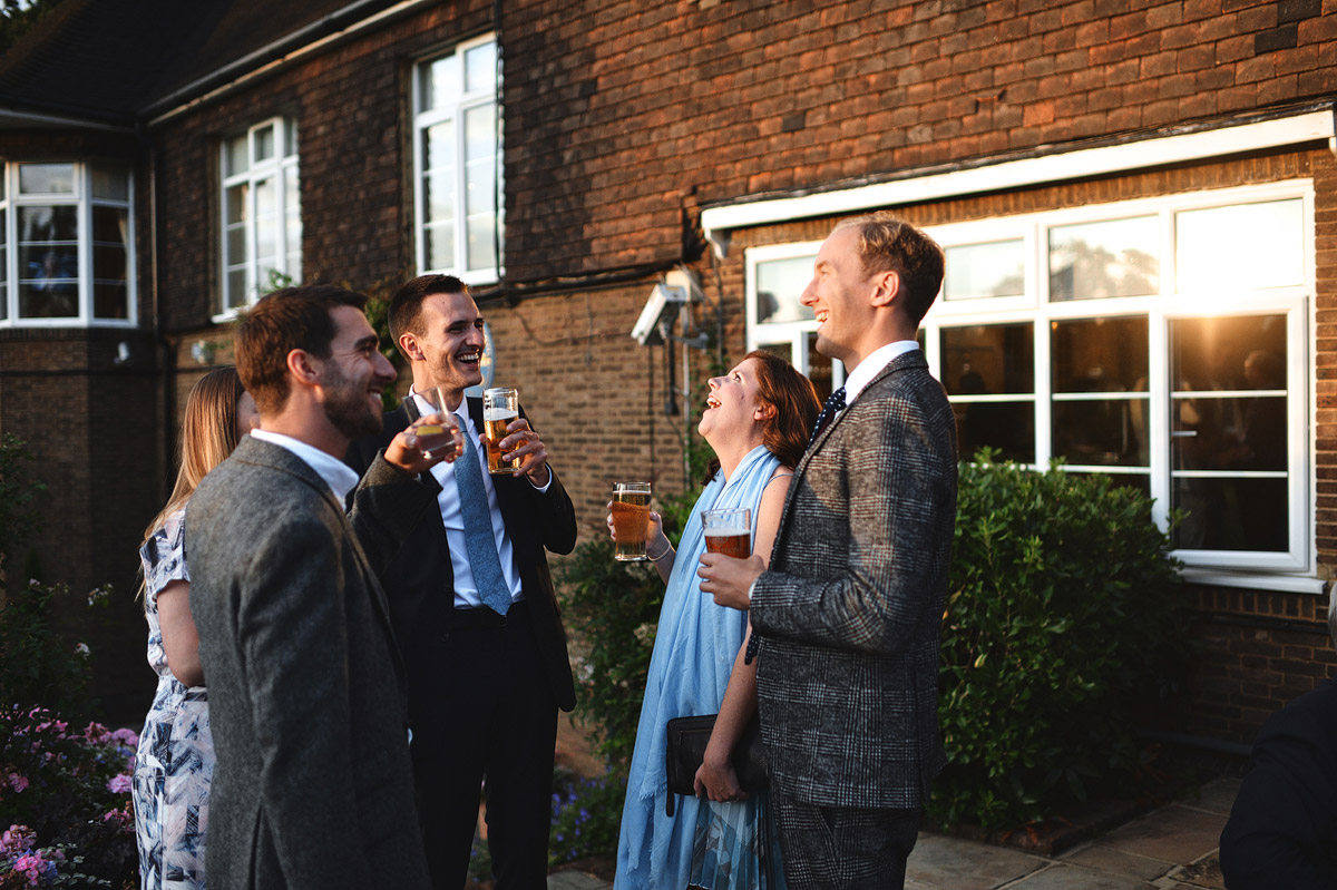 wedding guests in London golf course