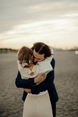 reading personal vows at Copenhagen beach